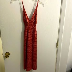 Rust cute comfy and sexy 100% silk dress with crossed straps in the back size 6